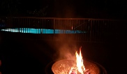 Camp Fire at Night Beside Pool